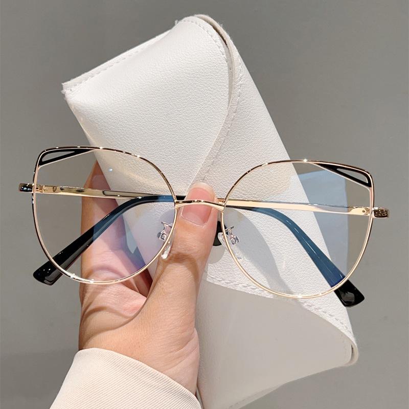 

High quality cat eye hollow metal eyeglass frame fashion simple anti blue light glasses for women Computer goggles flat lens