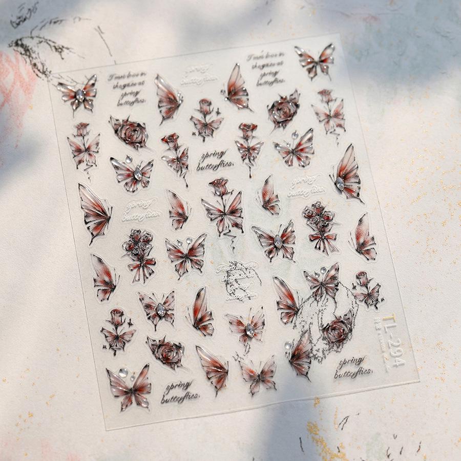 

Ferroso Мультяшные Бабочки Тисненые Стразы Наклейки для Нейл-арта (TL294)