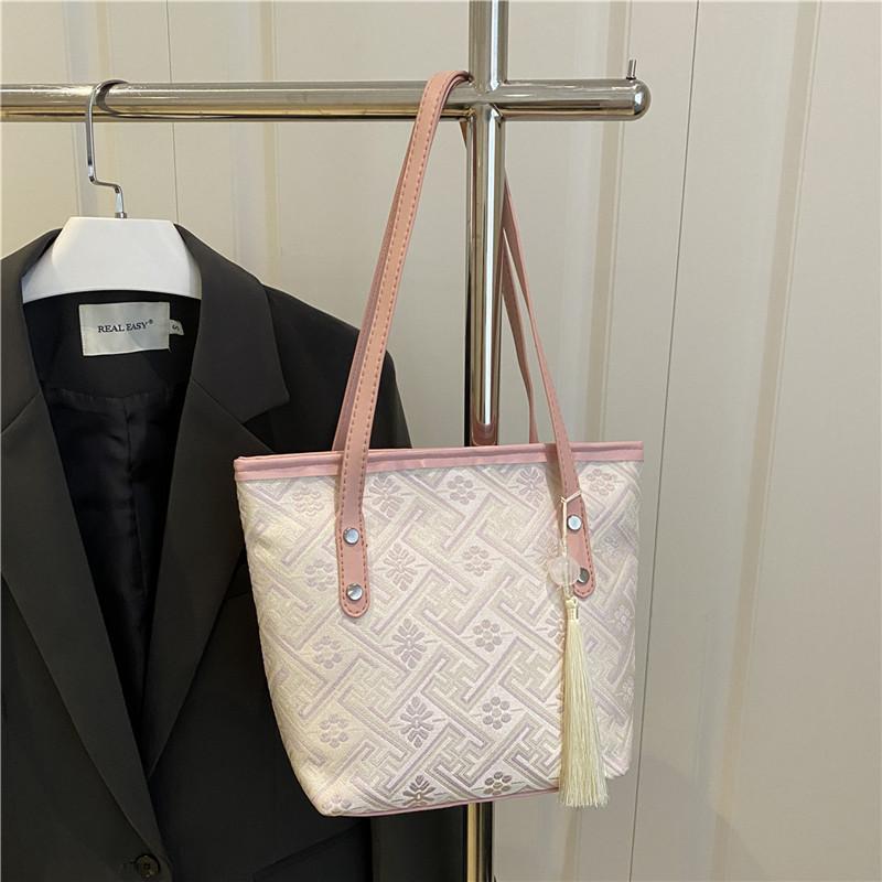 Fashion sense large capacity tote bag women's summer new casual shoulder portable college student class commuter bag