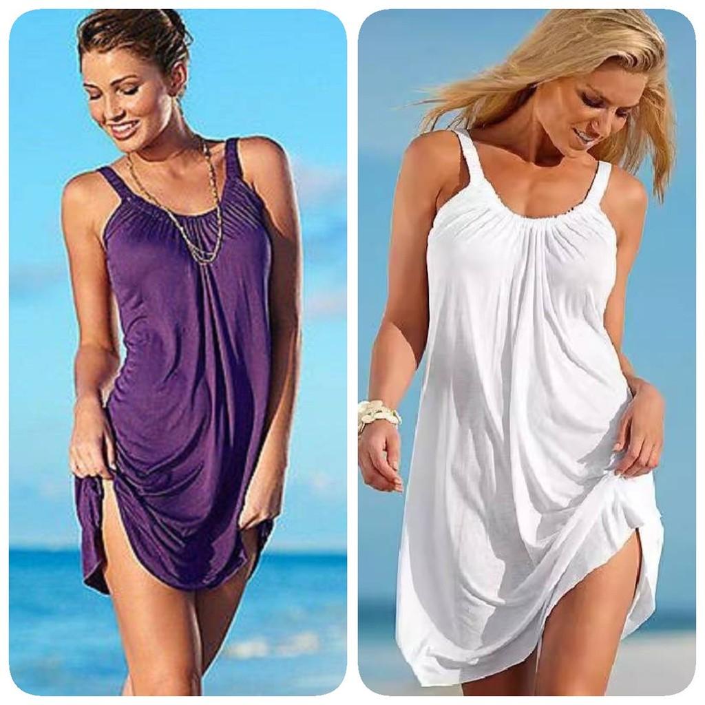 Elegant Casual Beach Dress With Stylish Straps And Unique Print Design