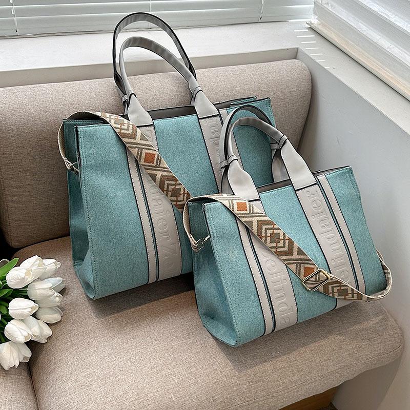 

Canvas bag women s large-capacity new spring and summer simple broadband messenger bag portable commuter tote bag