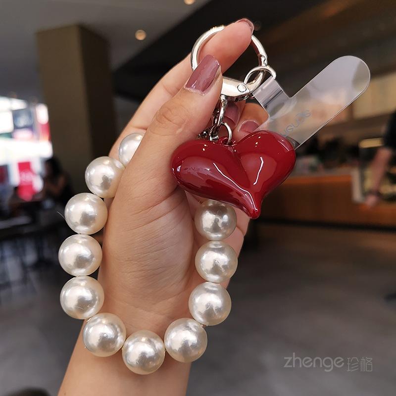 Butterfly love round bead mobile phone chain ins fashion women's hand chain wrist pendant bead pendant bag pendant