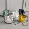 Kobe Lettuce Faux Leather Round Drawstring Bag [B1324] Women's One Size Ivory