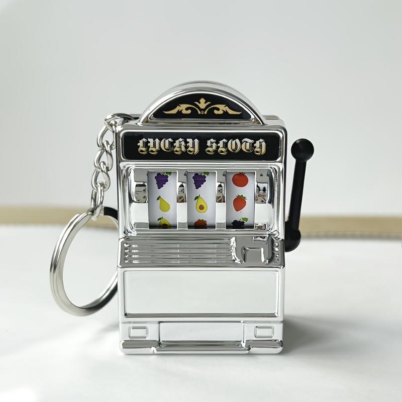 

Mini Slot Machine Toy, Funny Lucky Slot Machine Bank with Spinning Reel and Keychain, Nice as Creative Festival Present Birthday Cake 1PC срібний