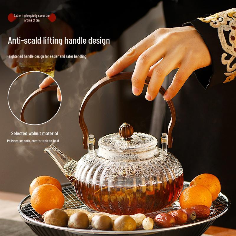 Pumpkin-Shaped High-Temperature Resistant Glass Teapot with Handle for Stove and Electric Ceramic Stove Heating.