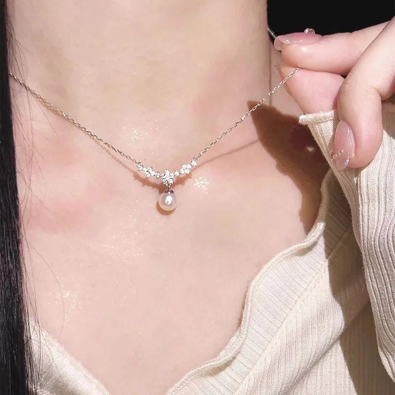 Micro-set zircon flower pearl necklace female niche temperament elegant clavicle chain high-end sense versatile clavicle chain