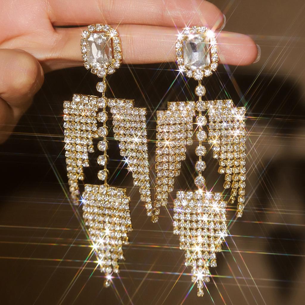 Advanced long style European and American exquisite tassel earrings, sweet beauty, metallic personality, forest style