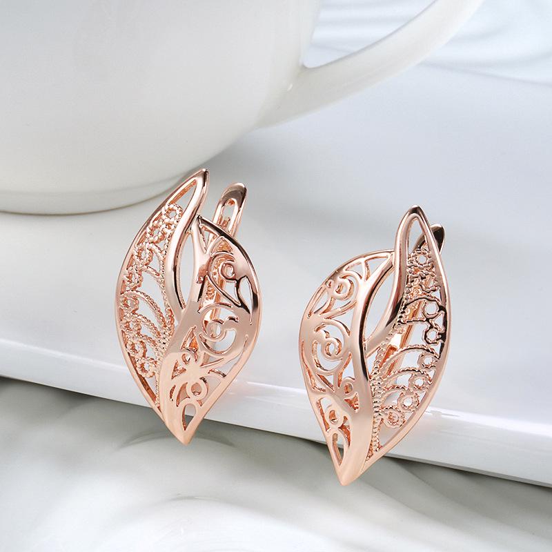 European & American 585 Rose Gold Carved Leaf Earrings - Cold Style, Simple Hollow Design for Ladies
