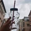 New Stock Cute Bear Shape Glass Cup 20oz 590ml Green Hat Bottles Beer Custom Logo Glasses Teddy Bear Glass Bottle with Lid Straw