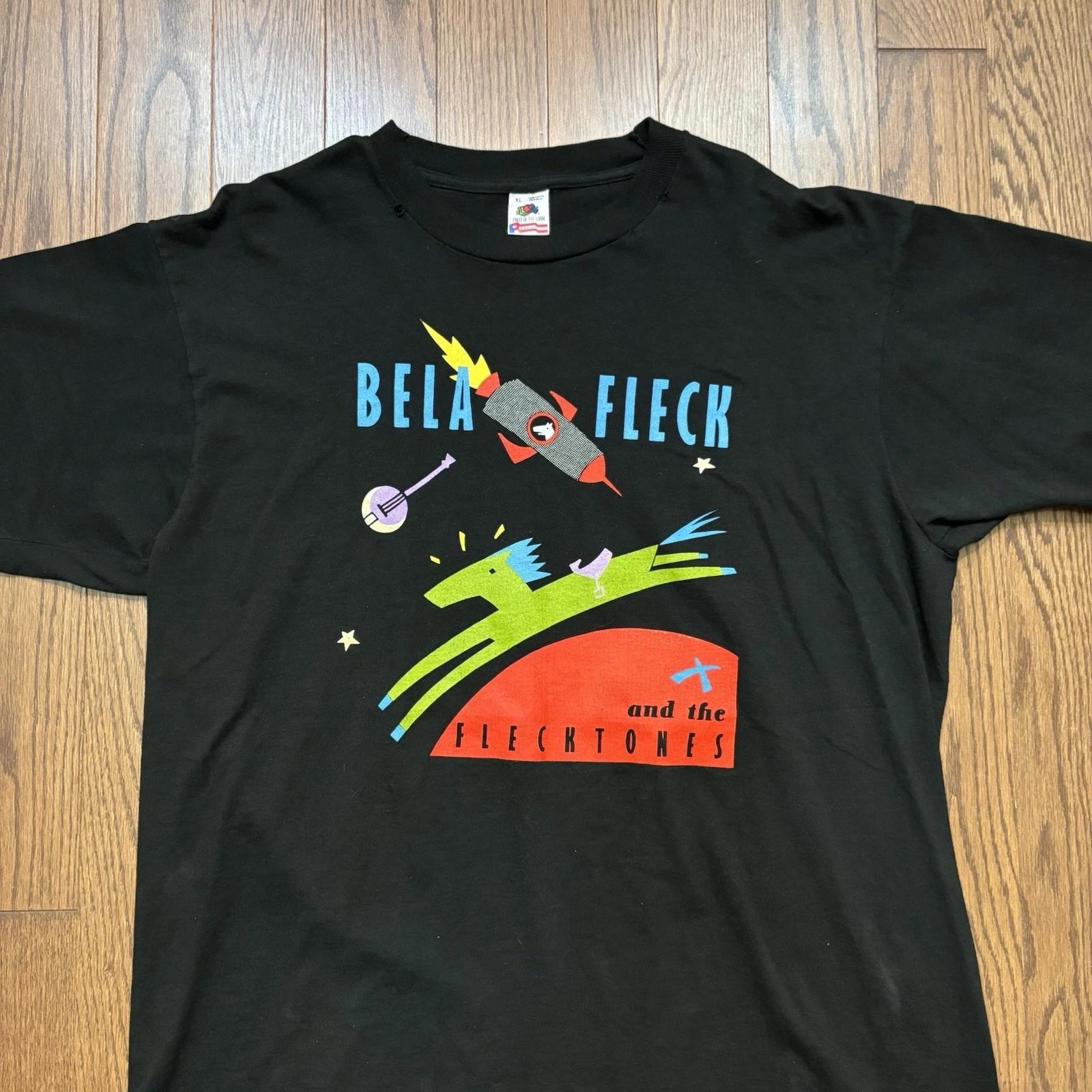 

Vintage Bela Fleck Flecktones Band T Shirt 80s 90s Black Faded Rocket Graphic XL L