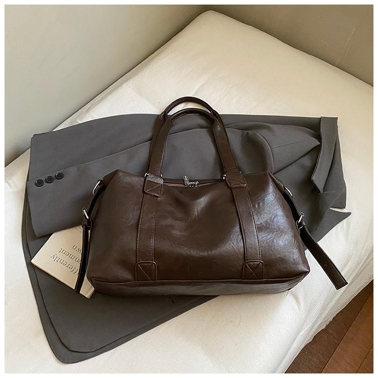 

2025 new fashion portable travel bag women s Korean version of leisure tote bag large capacity messenger bag luggage bag