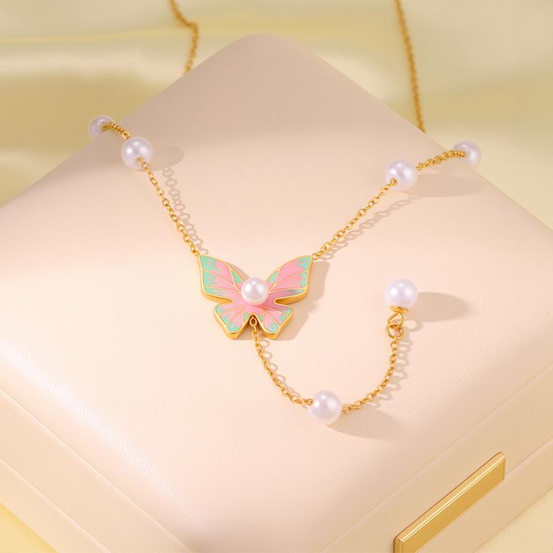 

Mori-Style Pearl Tassel Butterfly Necklace – Light Luxury Titanium Steel Jewelry for Women