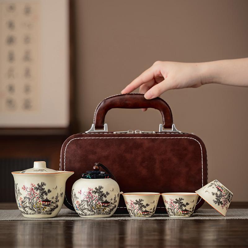 Company business annual meeting travel tea set Ru kiln black pine plum blossom clear rhyme hand grab pot fixed printing gift