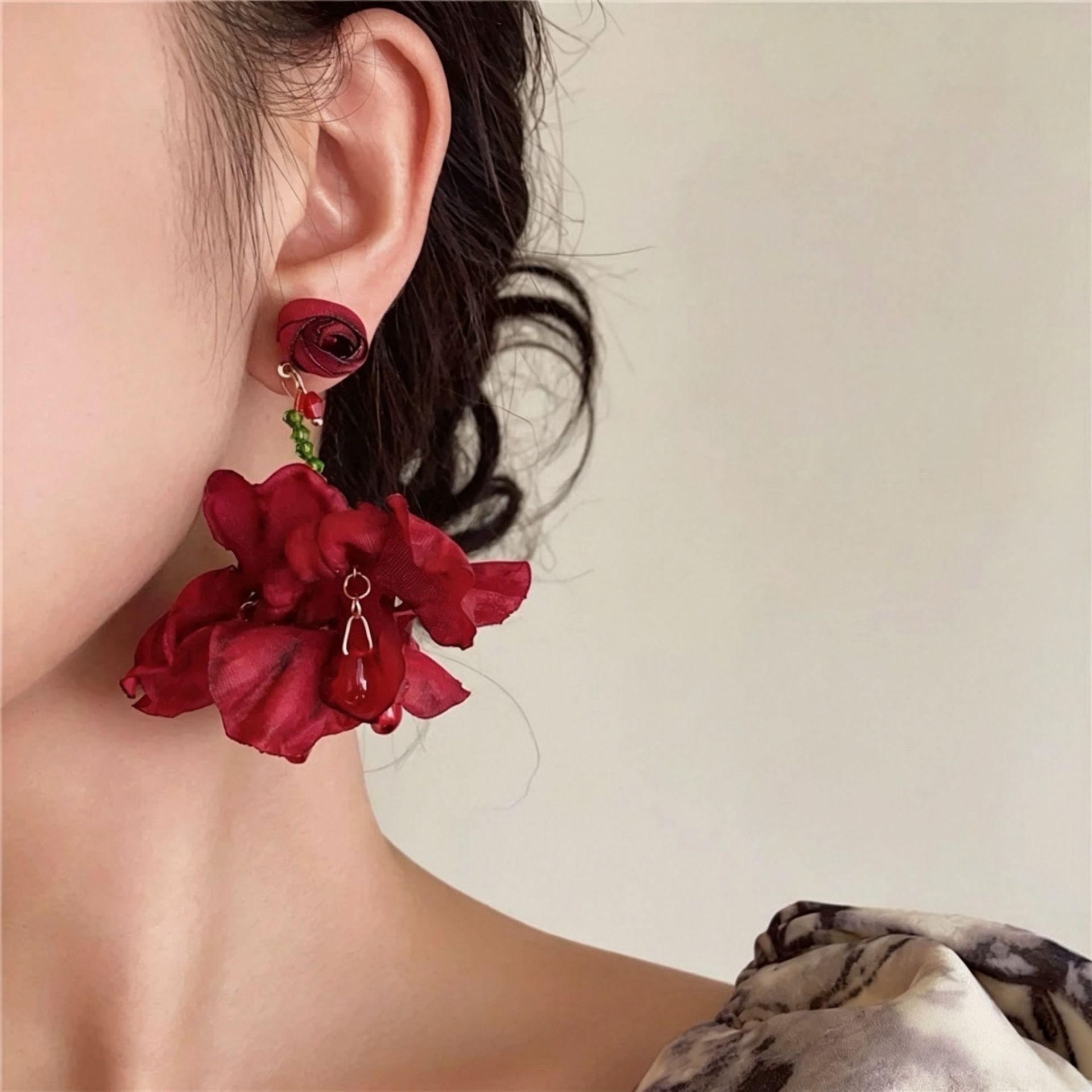 Holiday wind pink sweet flower earrings women s niche design beaded stud earrings seaside unique exaggerated earrings