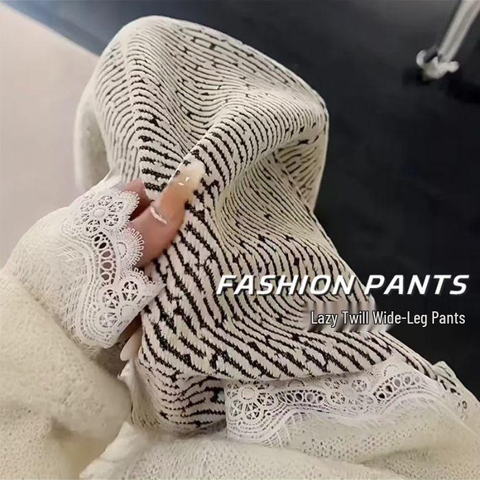 

Женские брюки клёш из тёмно-серого шенилла на осень/зиму 2024 года - Плотные, свободные, твилового дизайна, длиной до пола. M