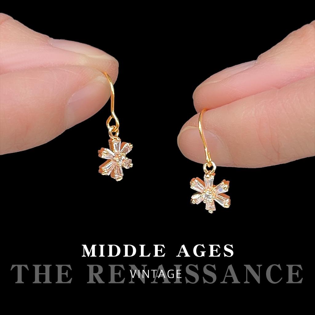 

Full of zircon daisy flower earrings French light luxury commuter earrings