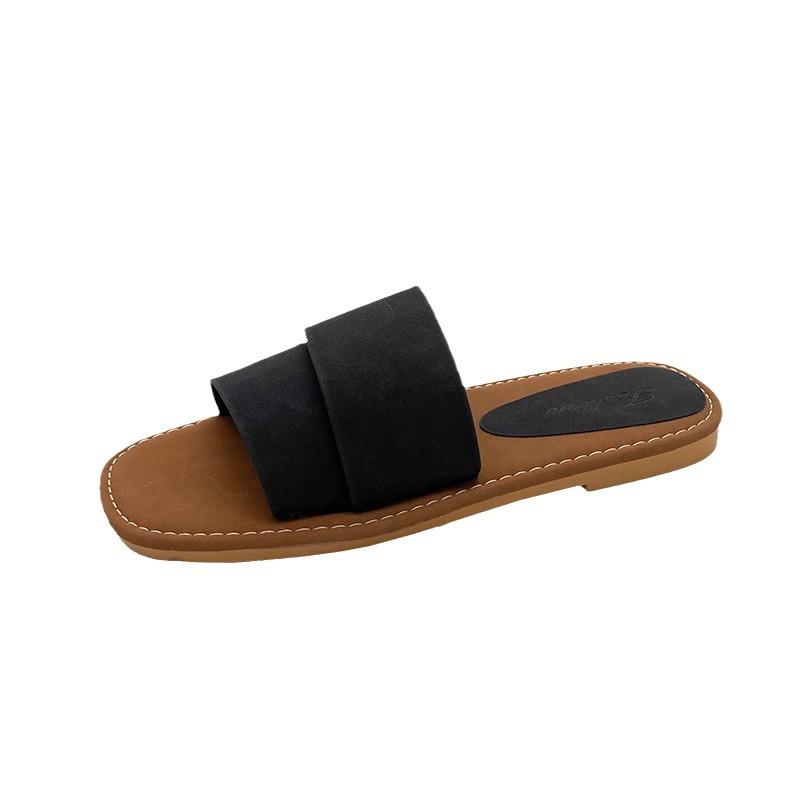 2024 summer new flat-bottomed niche simple one-word cool slippers female soft-soled fairy wind open-toed beach shoes