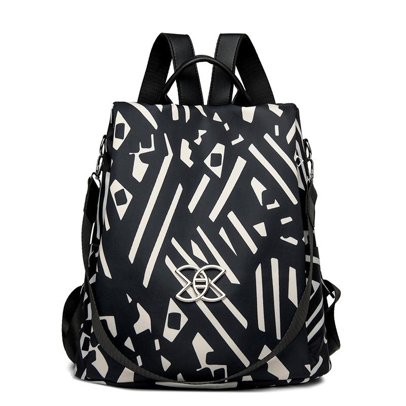 

Повседневный рюкзак из ткани Оксфорд для защиты от краж для женщин 2025 новая звезда слоненок большой вместимости одноплечевой рюкзак двойного назначения чёрный