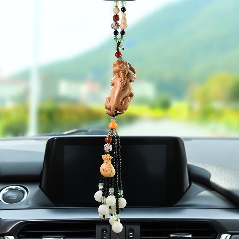 

**Pixiu Boxwood Car Ornament: Wealth, Fortune, Longevity**