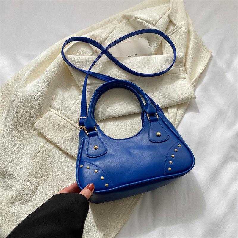 

Niche design 2025 new foreign style solid color handbag women s shoulder oblique span bag casual trendy fashion underarm bag синий