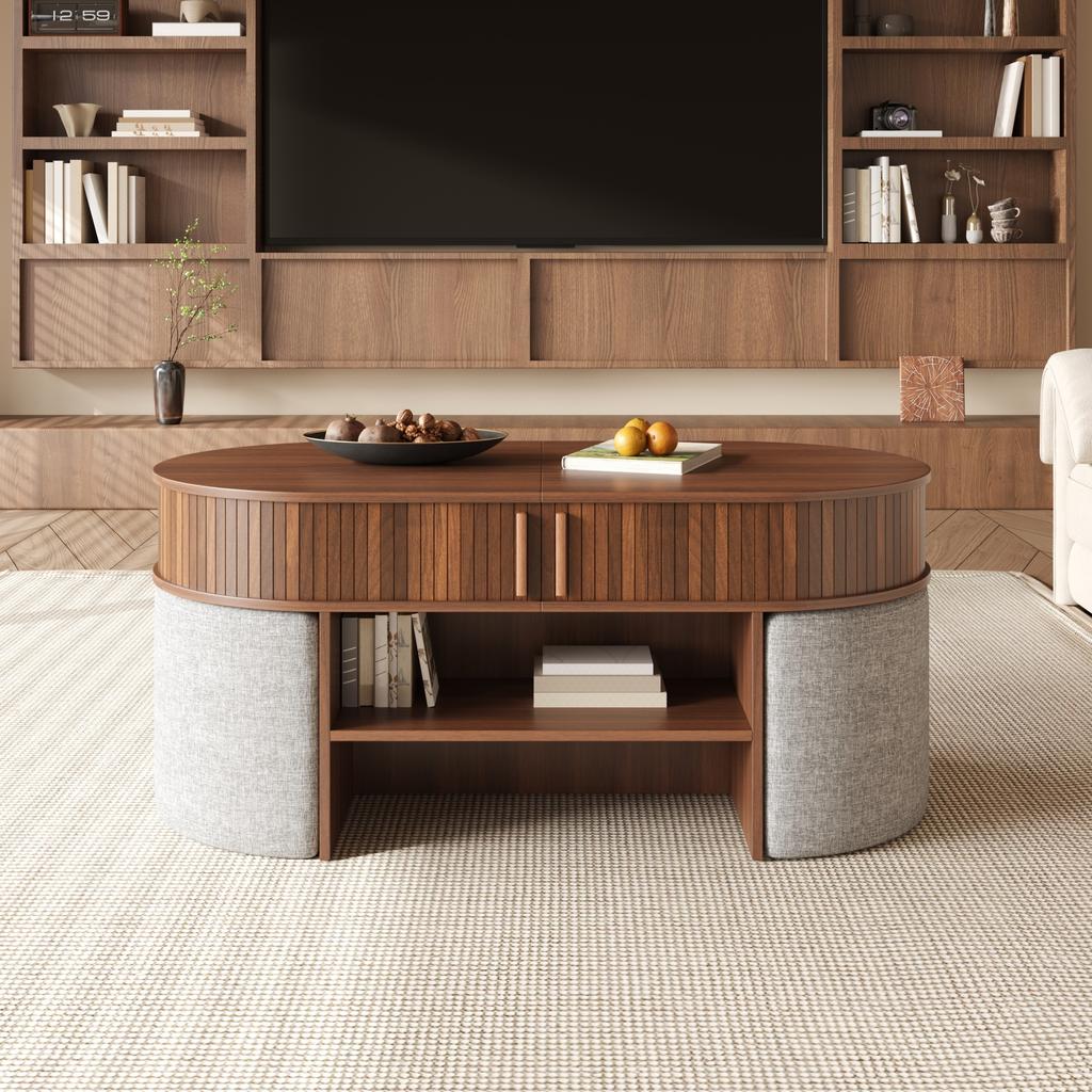 Oval storage coffee table with vertical fluted panelling, set with fabric stools, body made of particleboard+MDF, metal handles, with sliding doors