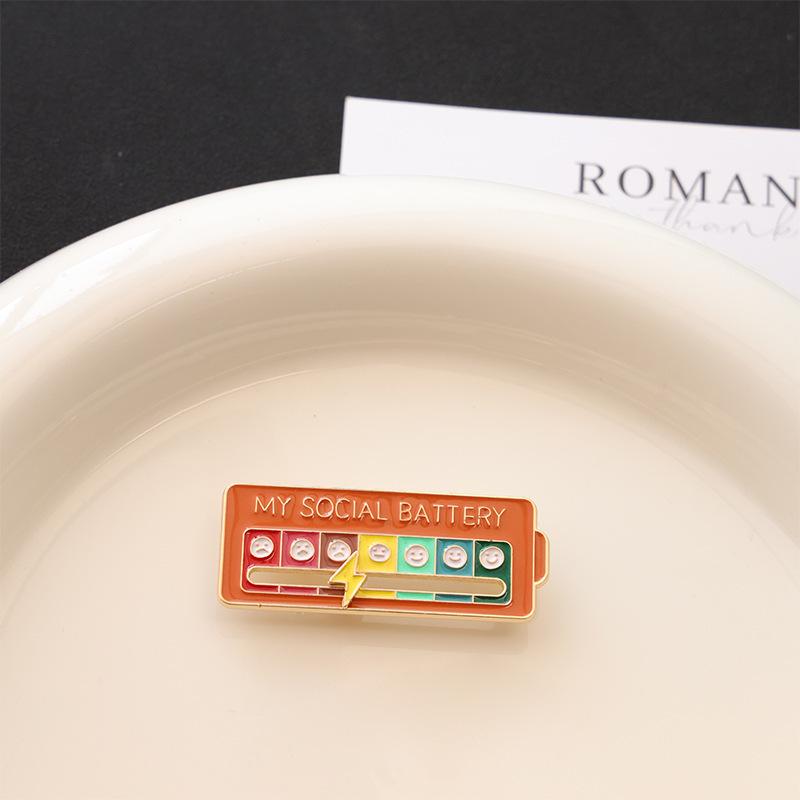 Humörförändrande energibrosch: Anpassningsbar social batterilegeringsnål