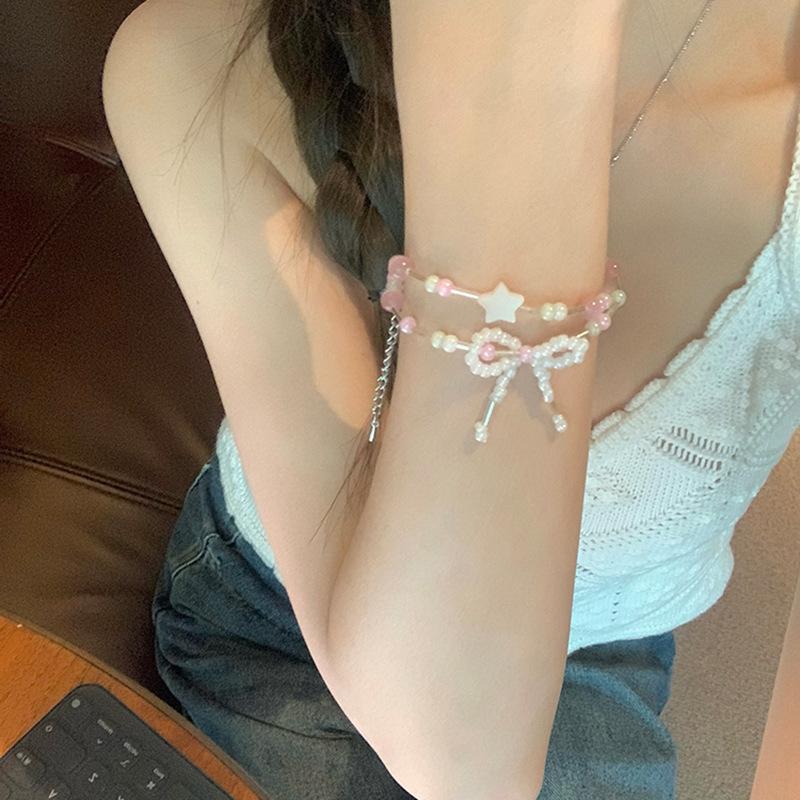 

opal star bow rice bead double-layer bracelet for women, stacking and wearing high-end bracelets, sweet and versatile jewelry.