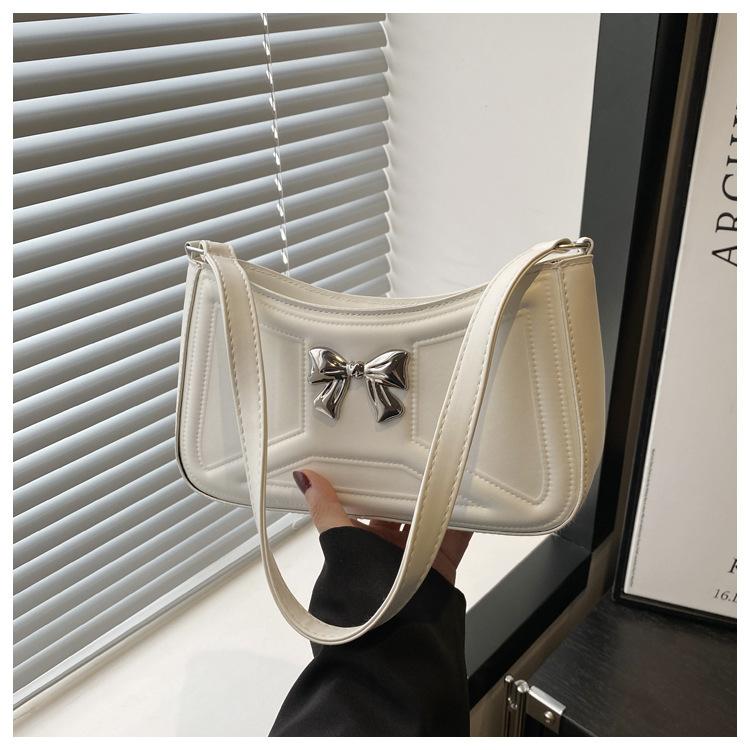 22 Spring New Textured Bow Tide Indentation Fresh Stylish Simple Underarm Shoulder Bag