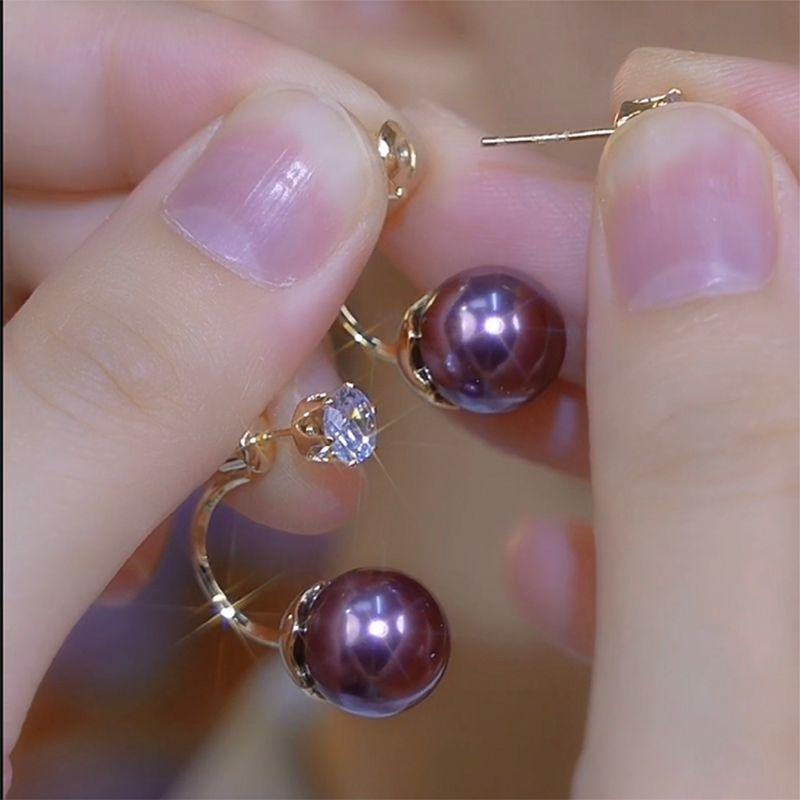 

2024 New Arrival Front and Back Rhinestone Pearl Stud Earrings Niche Design Classy Earrings Unique Dual-Wear Earrings for Women 33800.00G wearing pearl earrings