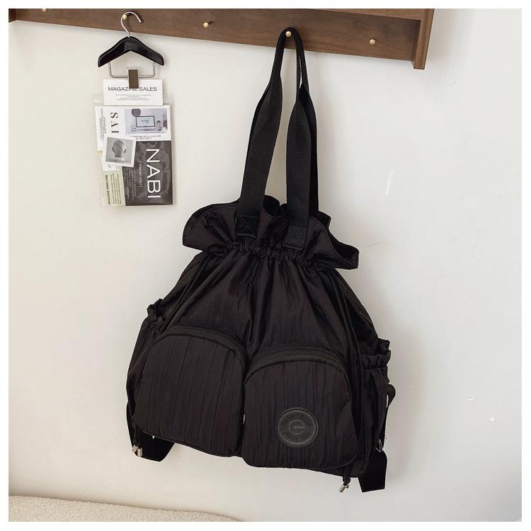 

2025 fashion drawstring backpack women s new casual simple large-capacity backpack portable fashion versatile shoulder bag чёрный