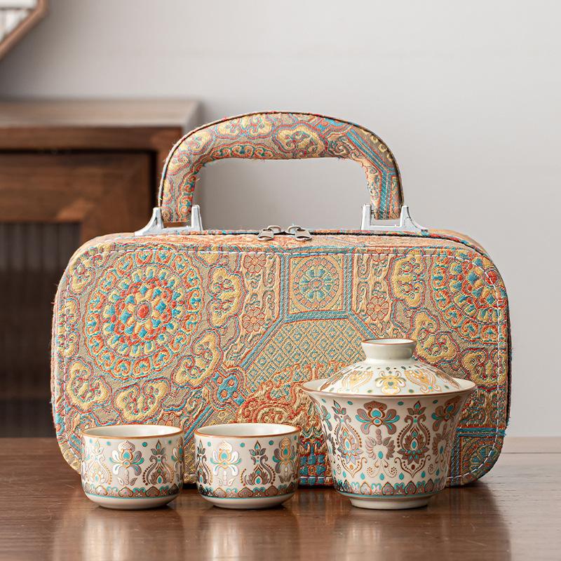 Dunhuang merchandise gold and silver wrong cover bowl two cups travel tea set embroidery bag complete set portable gift box business souvenir