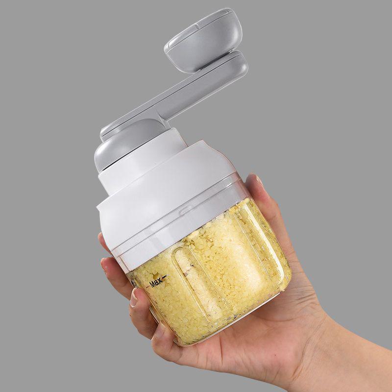 Manual Pull-Crank Garlic Press & Mincer: Compact Handheld Grinder & Chopper