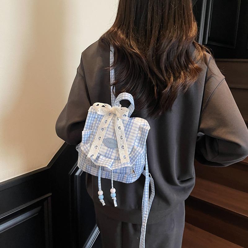 Wind lace plaid backpack autumn new niche design fluffy ruffle edge diagonal span bag women