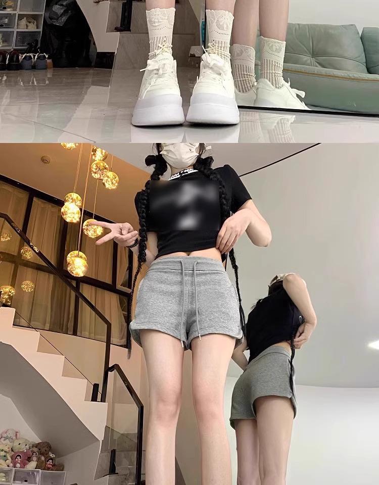 Women's Spicy Girl Black Drawstring Casual Shorts: Autumn Elastic Waist, Slit Straight Leg, Solid Color Fashion.