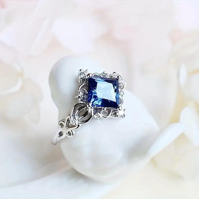 Cao Shi Aquamarine Simulated Gemstone Ring with Rhomboid Zircon Embellishment - Elegant Princess Design