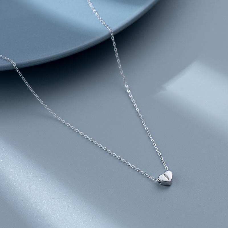 S925 Silver Heart-Shaped Initial Necklace - Korean Style Clavicle Chain with Trendy Peach Heart Design.
