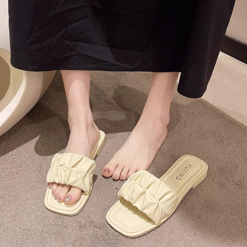 Factory direct sales French flat-bottomed cool slippers women's summer fashion 2025 new models with skirts high-end beach slippers