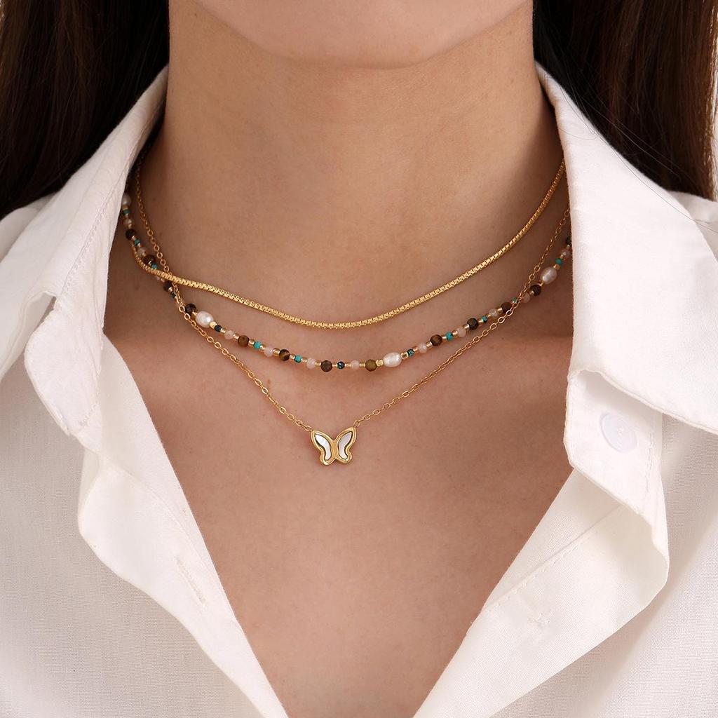 Elegant Pearl & Butterfly Pendant Necklace - Women's Titanium Steel, High-End European & American Fashion.