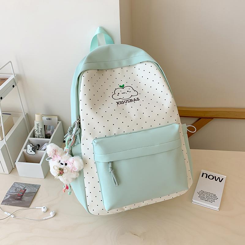 Schoolbag schoolbag junior high school girl cute girl heart polka dot backpack large capacity college student 1011 new backpack
