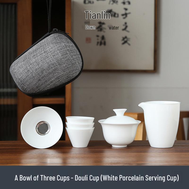 Dehua White Porcelain Travel Kung Fu Tea Set with Bag: 1 Bowl, 4 Cups, Glass Quick Cup, Gift Option, Customizable Logo.