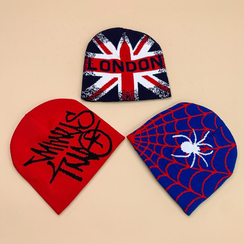 New European and American popular alphabet flame spider skull knitted hat men and women autumn and winter personality hip hop warm