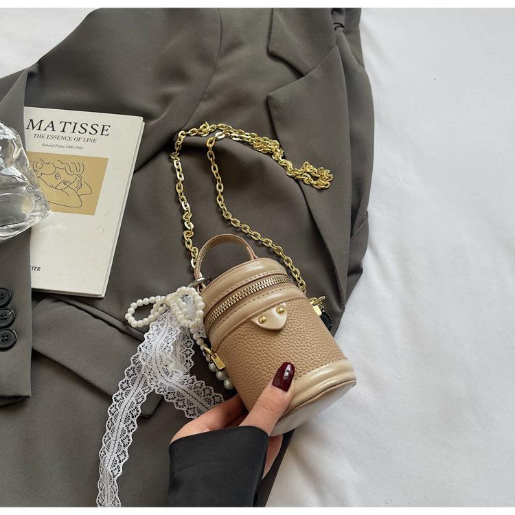 

2025 spring shoulder women s bag new Korean version of high-end texture fashion versatile contrasting color foreign gas chain drum bag