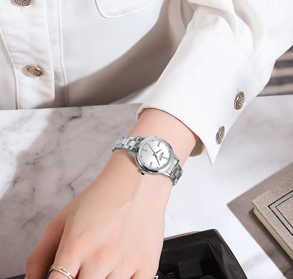 CURREN 9094 Women's Waterproof Quartz Watch: Stainless Steel Strap, Korean Style with Rhinestone Accents.