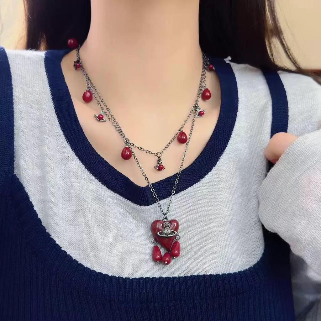 Kaiserin Cixi Angkorrot Quastenkette: Elegante Pulloverkette für Damen