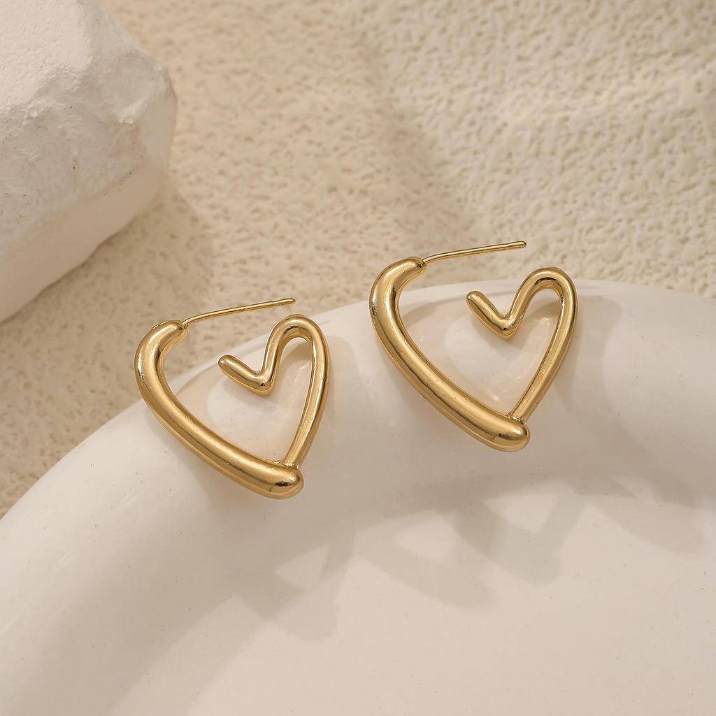 Chic Minimalist Twisted Round Hoop Earrings for Women - Elegant European & American Style