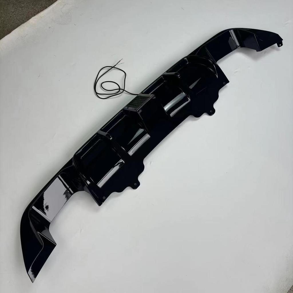 Bright Black BMW E60 Body Kit: Dual Exhaust, Illuminated Bumper Lip, Rear Diffuser