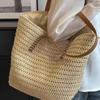 Woven Straw Beach Tote: Large Capacity, Elegant Openwork Design, Fashionable Single Shoulder Bag.