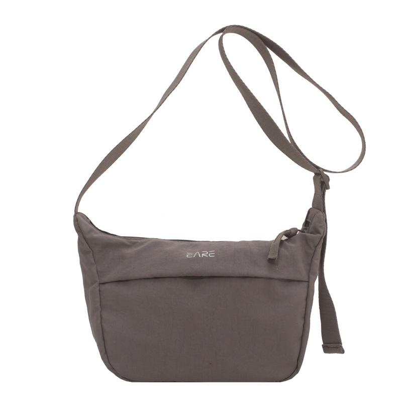 

Женская маленькая сумка кроссбоди 2025 новая маленькая тканевая сумка простая нейлоновая сумка через плечо японская студенческая сумка тренд