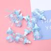 Lot de 30 jolies boîtes à bonbons en forme de biberon, bleues, pour la décoration d'événements, de baptêmes et de fêtes.