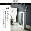 Slim, thin, Scandinavian-inspired umbrella stand for entryways. Tower design, simple, available in white and black. Yamazaki Industries (white).